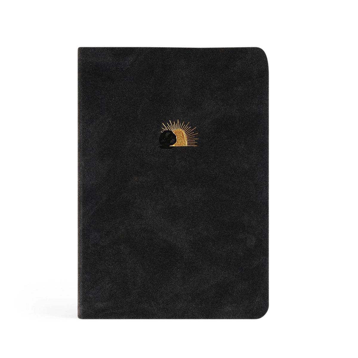 Black faux-suede notebook with a small gold sun rising behind a rolled-away stone