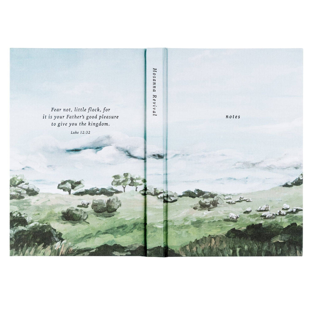The green hills notebook opened flat, showing the painting wrapping front to back