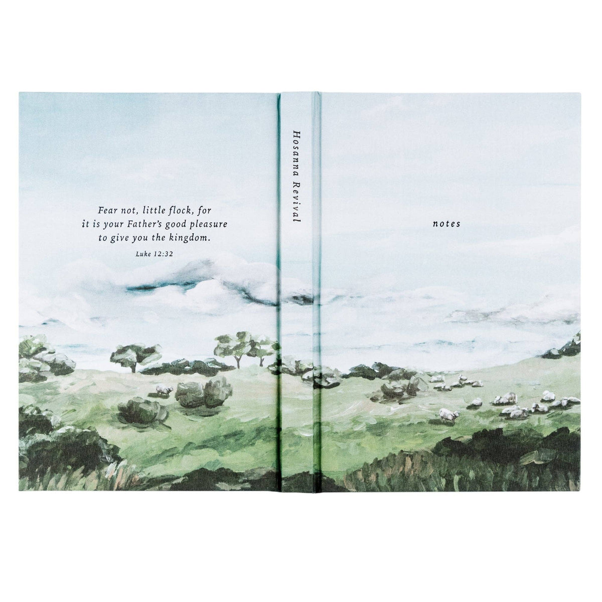 The green hills notebook opened flat, showing the painting wrapping front to back