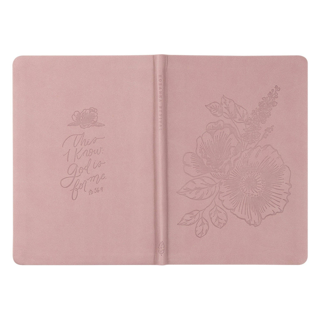 The mauve notebook opened flat, showing back and front covers
