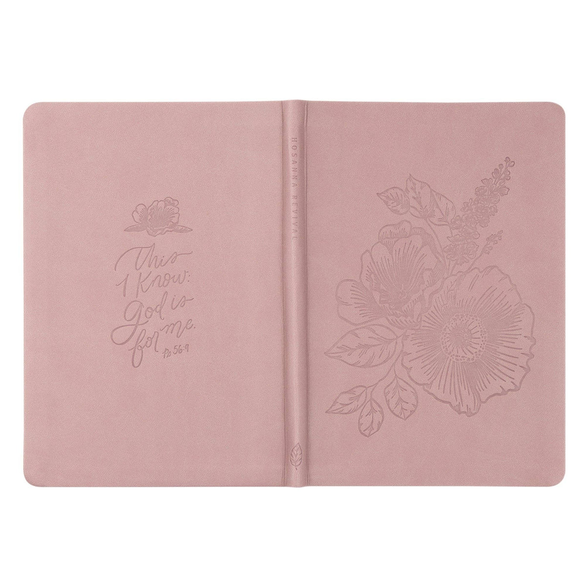 The mauve notebook opened flat, showing back and front covers