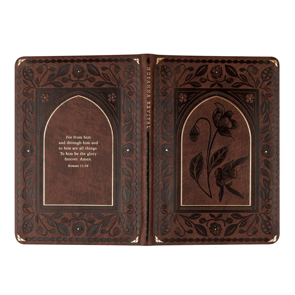 The arched notebook opened flat, showing back and front covers