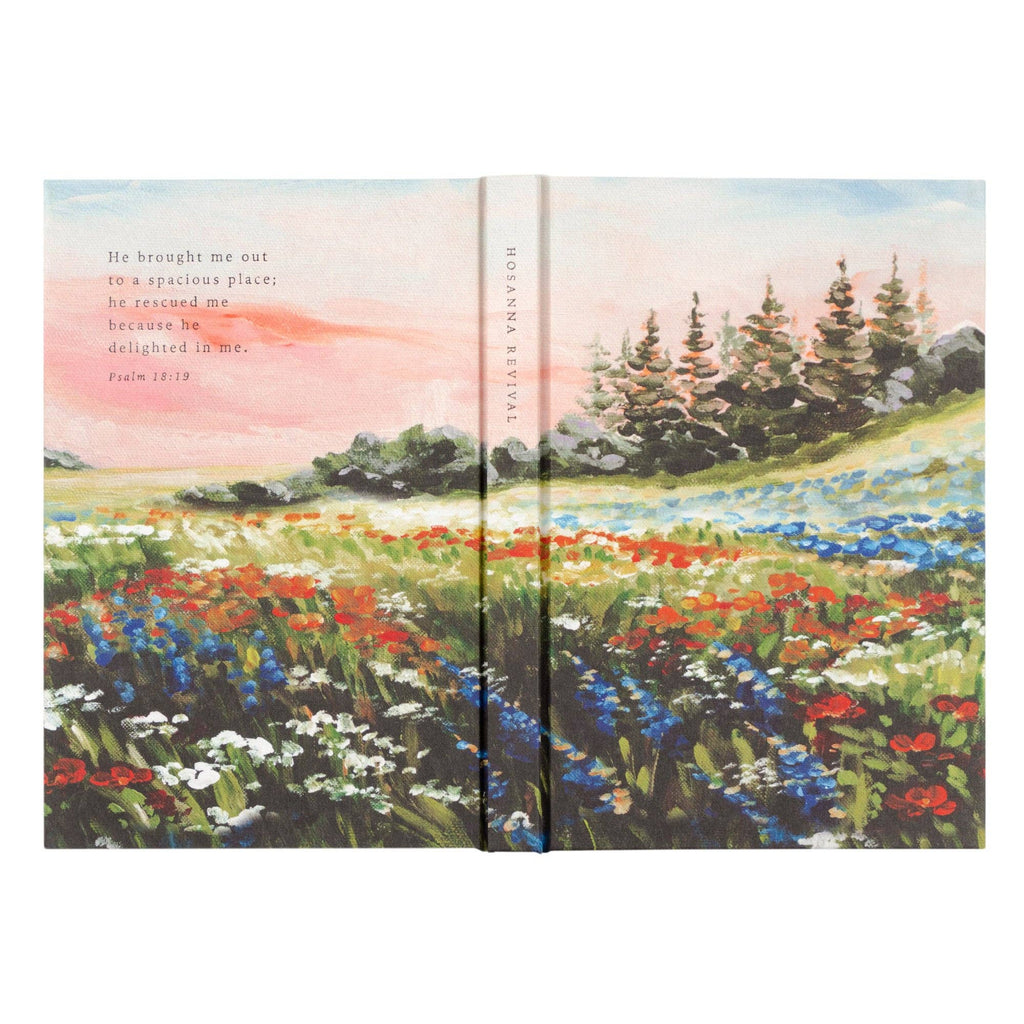 The meadow notebook opened flat, showing the painting wrapping front to back