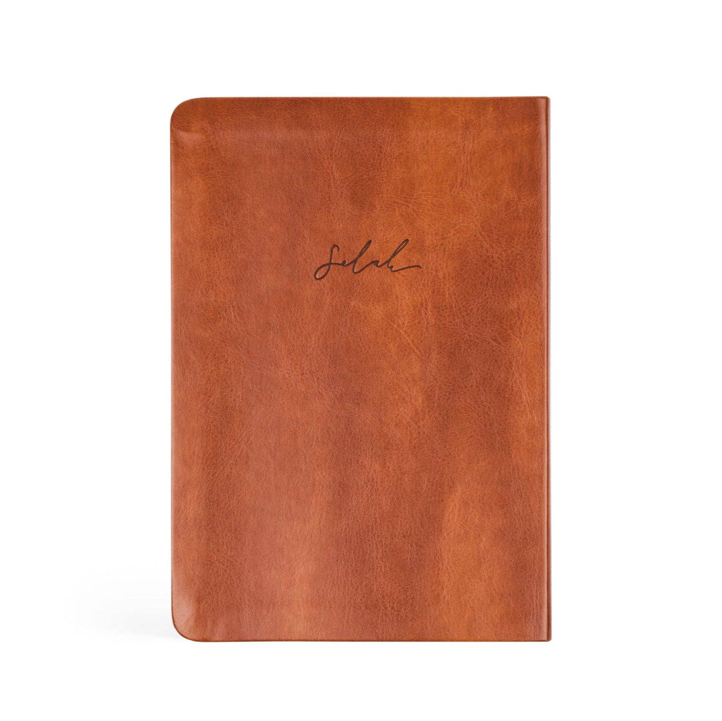 Back cover of the cognac notebook with "Selah" debossed in script