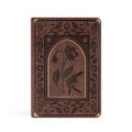 Brown faux-leather notebook debossed with an arched window, a single flower and a floral border