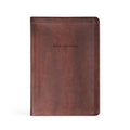 Deep brown faux-leather notebook debossed "Good + Faithful"