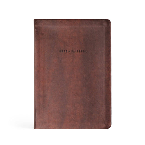 Deep brown faux-leather notebook debossed "Good + Faithful"