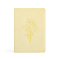 Butter yellow faux-suede notebook with a tone-on-tone daffodil bouquet