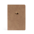 Taupe faux-leather notebook with a small gold sun rising over a rock