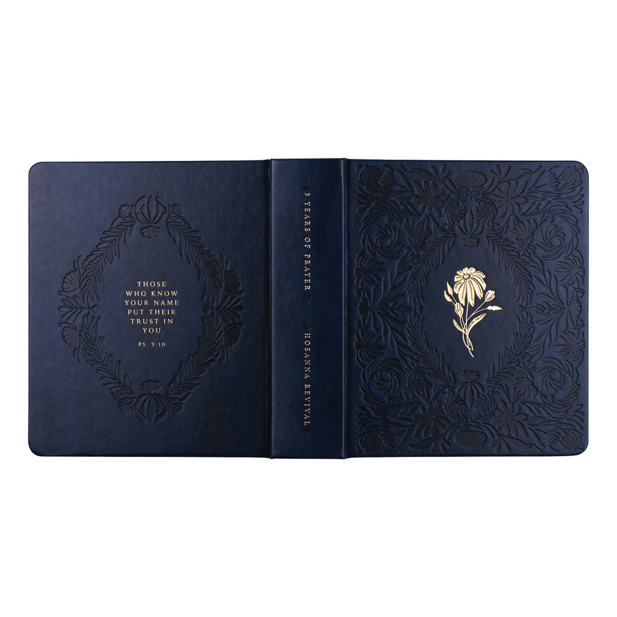 The navy journal opened flat, showing back and front covers