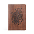 Dark brown faux-leather notebook with a debossed bouquet of roses and poppies