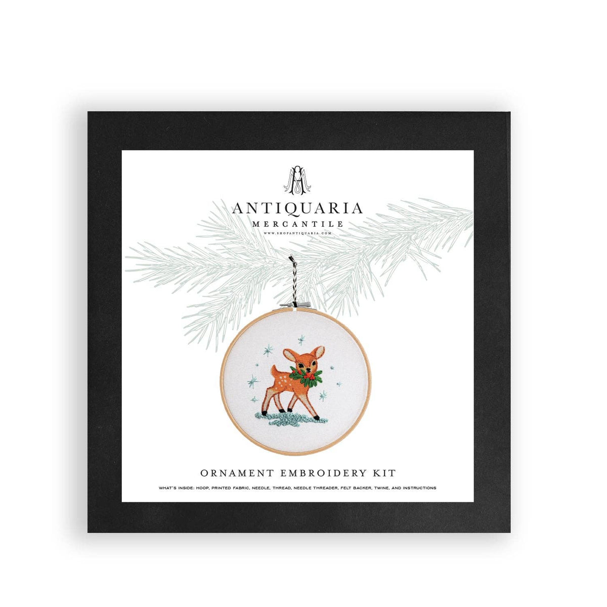 The festive deer ornament kit in its black box
