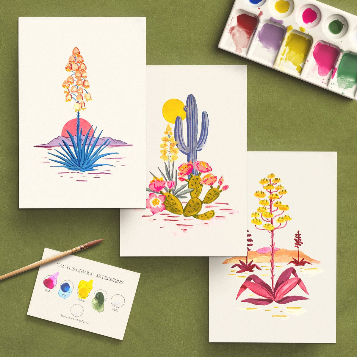 Three finished paintings: agave at sunset, a saguaro with prickly pear, and a flowering yucca