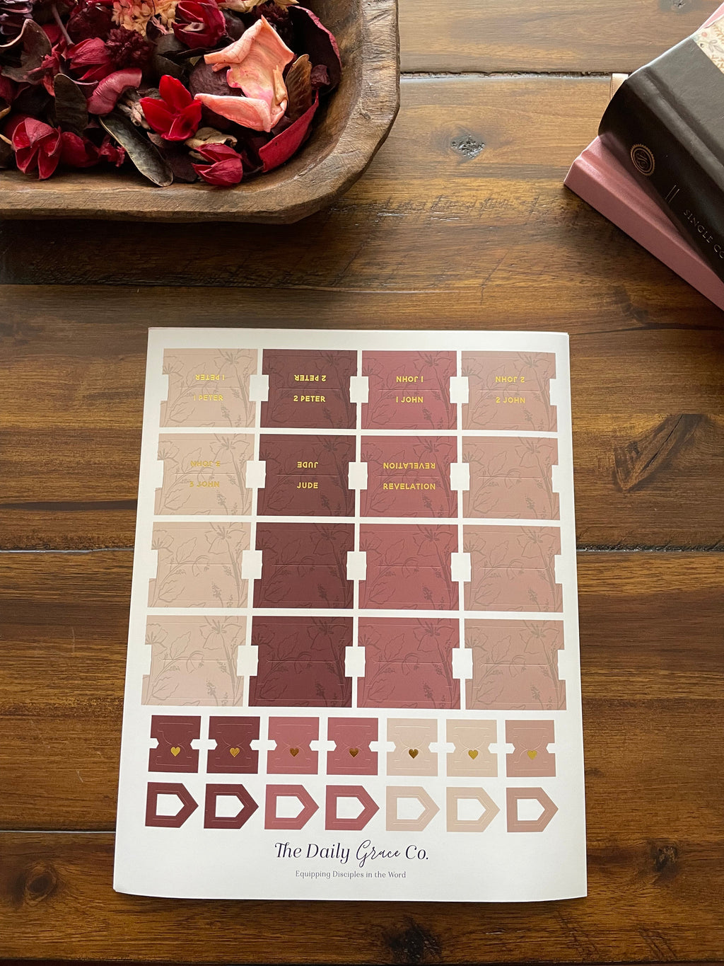 Sheet of Bible tabs in dusty rose and burgundy with arrow-shaped extra tabs