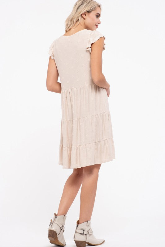 Back view of the cream tiered dress