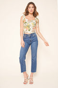 Cream floral cropped top with tie shoulder straps, worn with cropped jeans