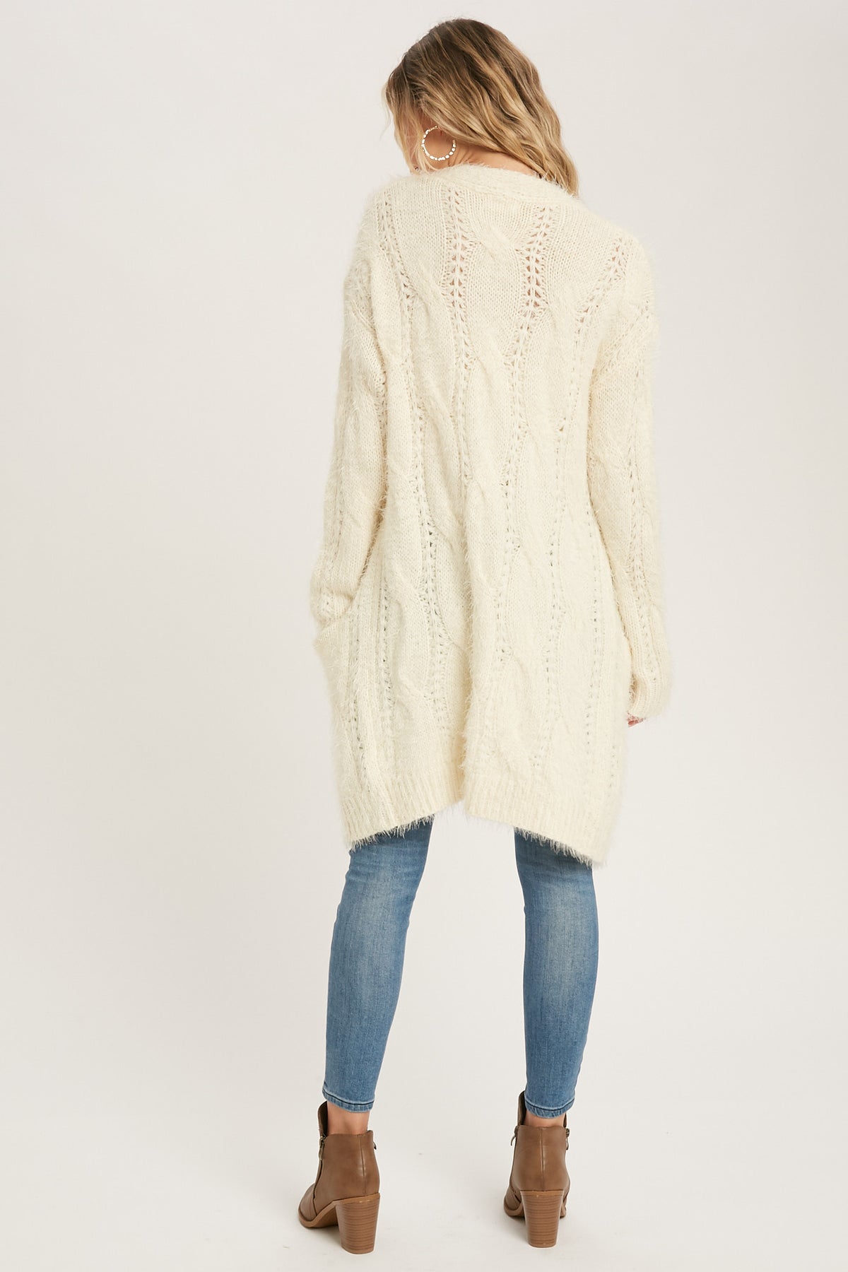 Back view of the ivory knit cardigan