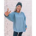 Dusty blue crewneck sweatshirt with "CHOSEN" in tone-on-tone letters