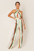 Halter jumpsuit in green, rust and cream painterly stripes with wide legs and a tie waist