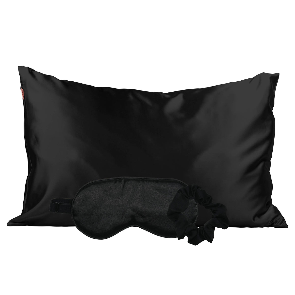 Black satin pillowcase with a matching sleep mask and scrunchie