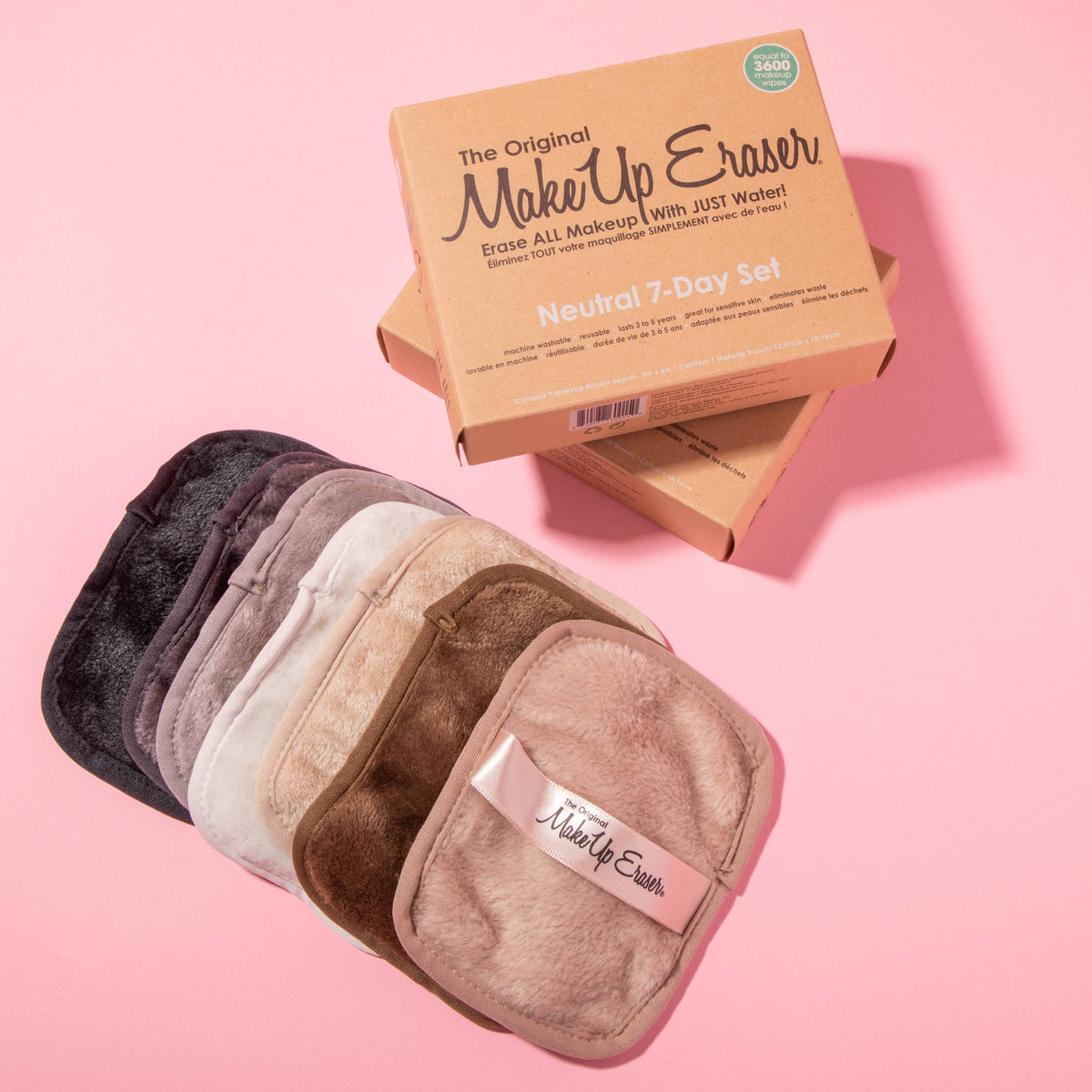 Seven makeup removing pads in neutral shades from cream to deep brown, with their box