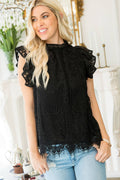 Black lace mock-neck top with flutter sleeves and a scalloped hem