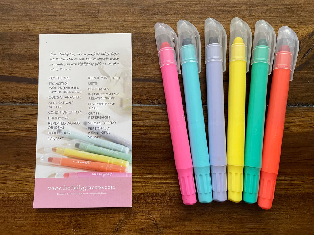 The six pastel highlighters beside their Bible highlighting guide card