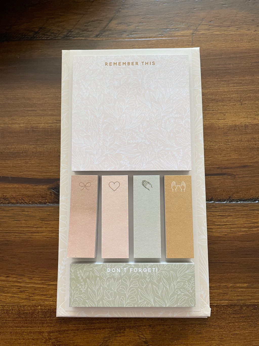 Open sticky note set: a floral "Remember this" pad, four page flags and a "Don't forget" strip