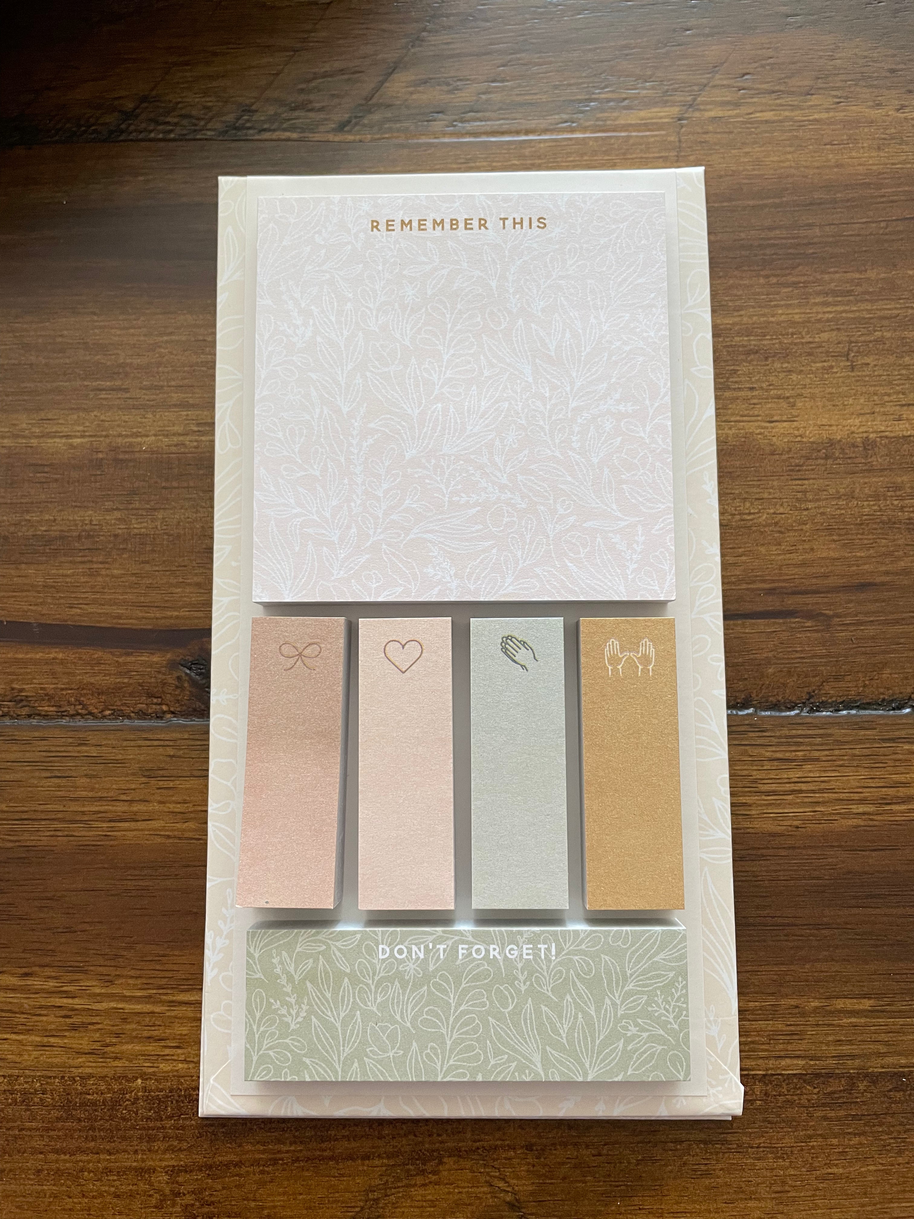 Open sticky note set: a floral "Remember this" pad, four page flags and a "Don't forget" strip