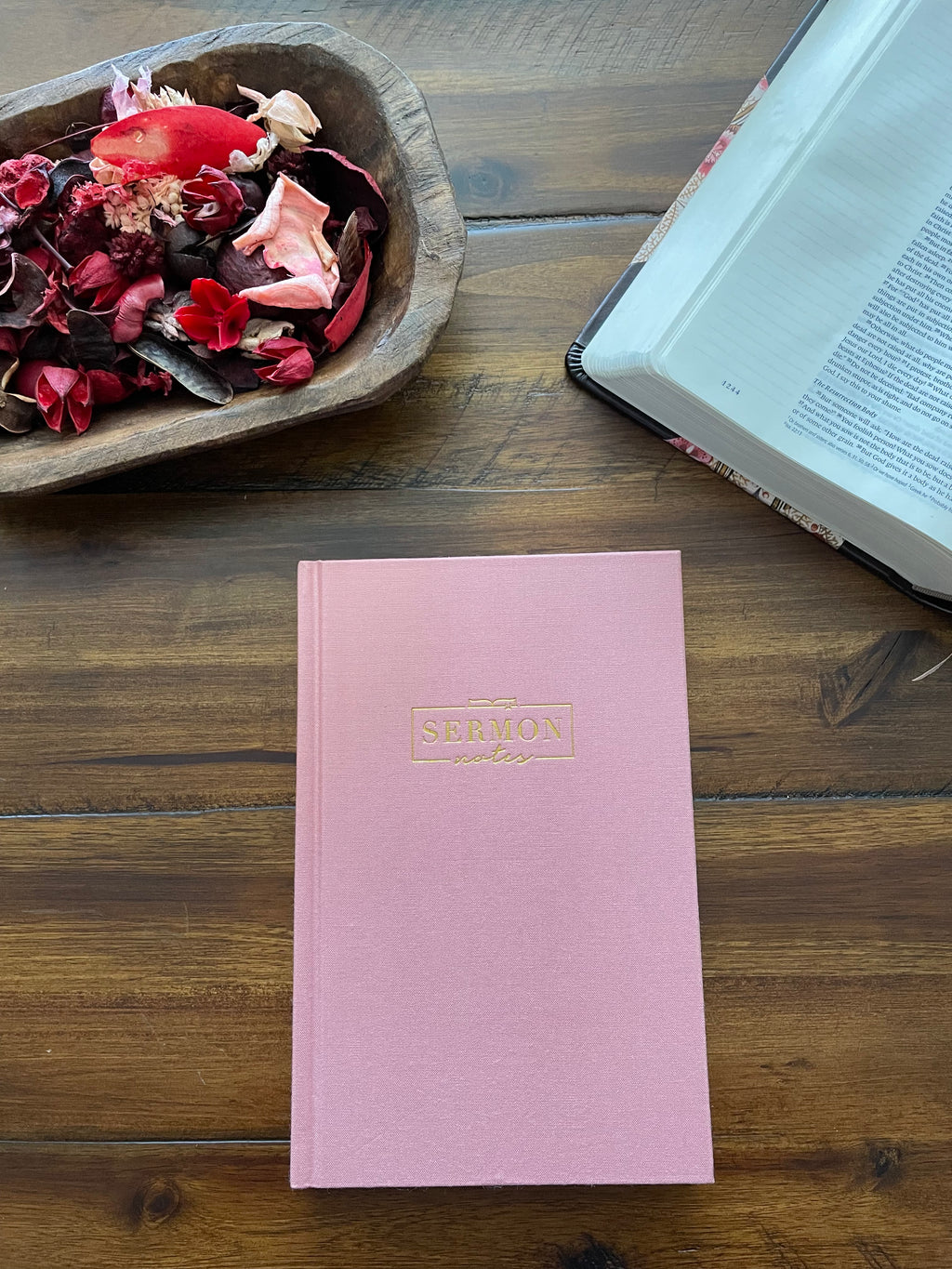Pink linen-covered sermon notes journal with a gold-foiled title
